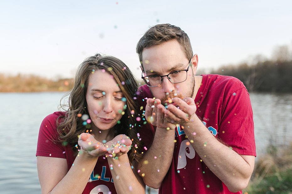 Couple blowing ice cream sprinkles on shores of Speedwell Forge Lake by the Jepsons.