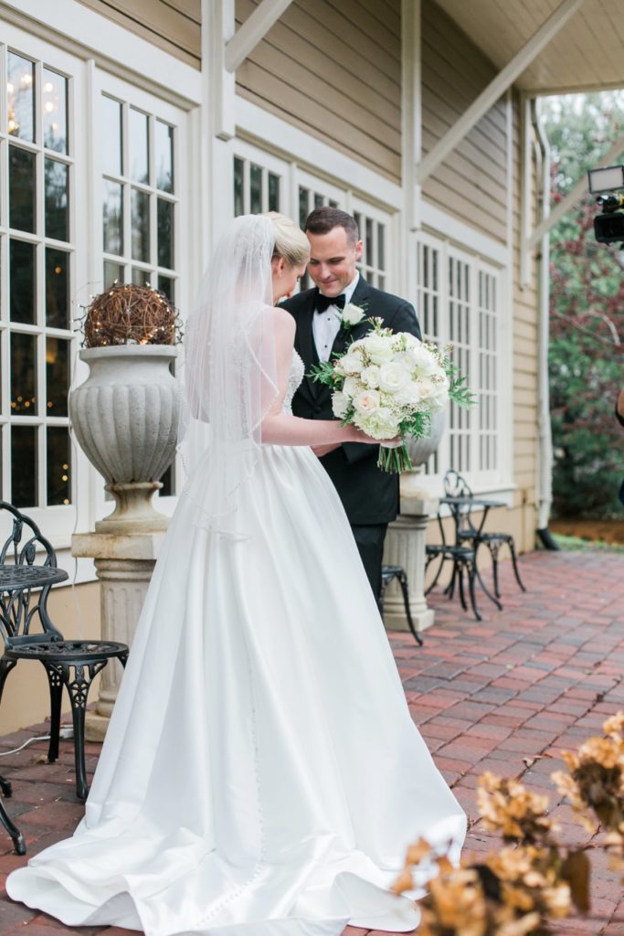 Bride and groom first look at the Inn at Leola Village by the Jepsons