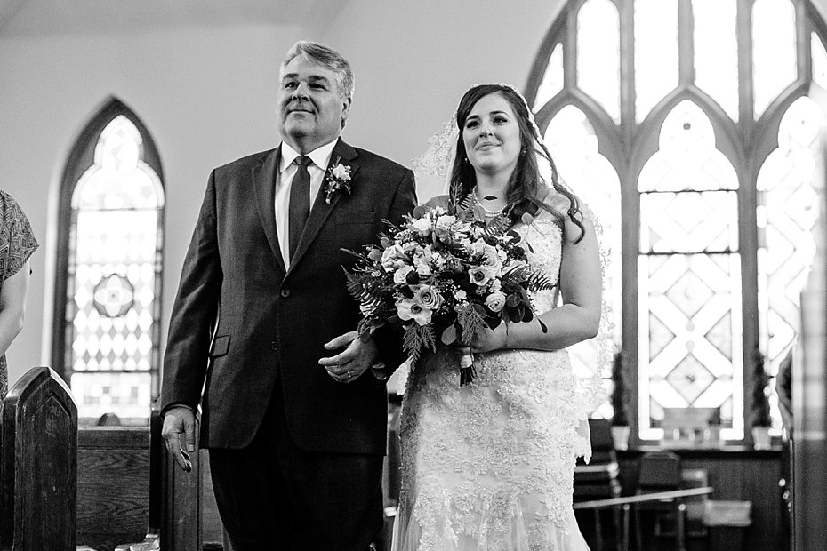 bride walking down the aisle at Zion Community Church in Bellefonte PA by the Jepsons