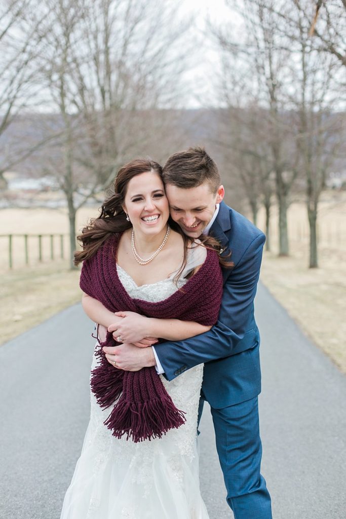 bride and groom with burgundy shawl in Bellefonte PA by the Jepsons