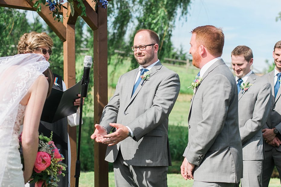 Brother of the groom jokes during ceremony at Gillbrook Farms wedding