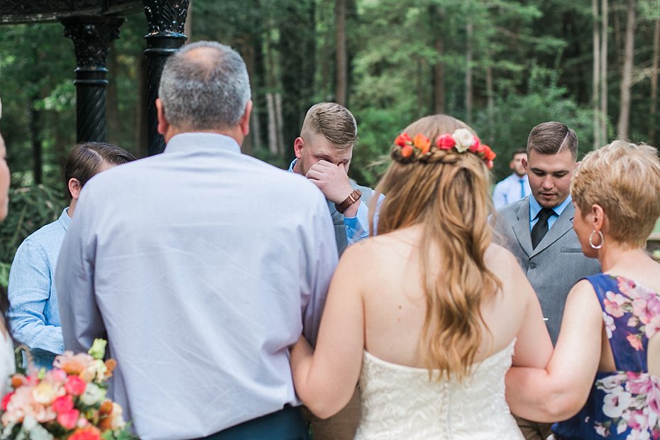 groom emotional as bride walks down the aisle in central PA outdoor wedding