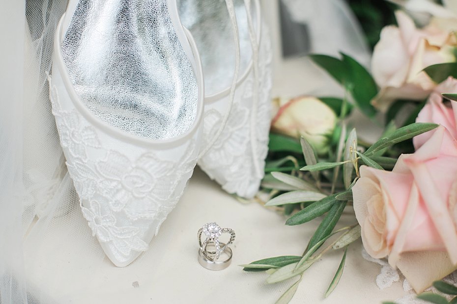 wedding shoes with rings and florals at White Chimneys