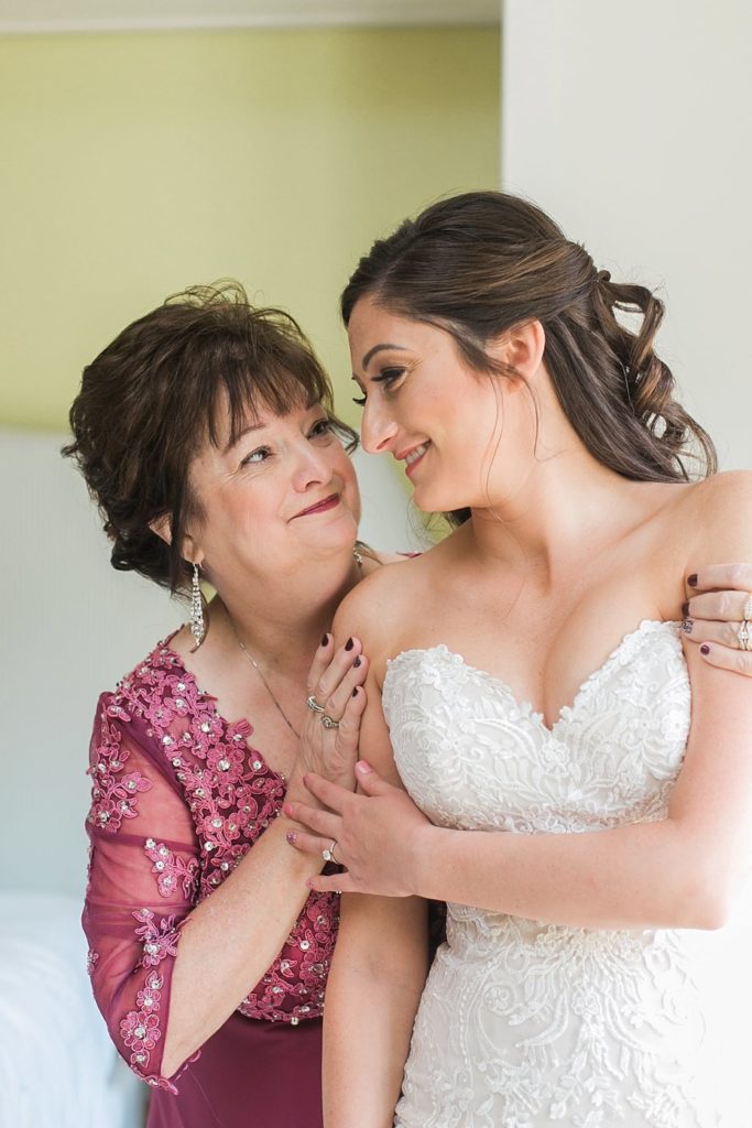Bride and mom embrace at Omni Bedford Springs wedding