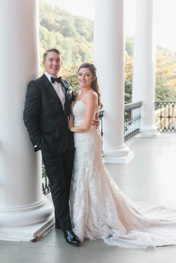 Bride and groom on terrace at Omni Bedford Springs by the Jepsons